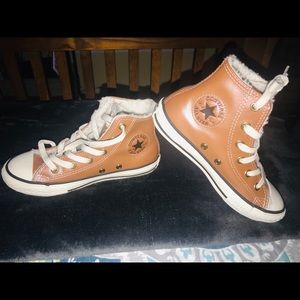 Leather Chuck Taylor All Star athletic shoes